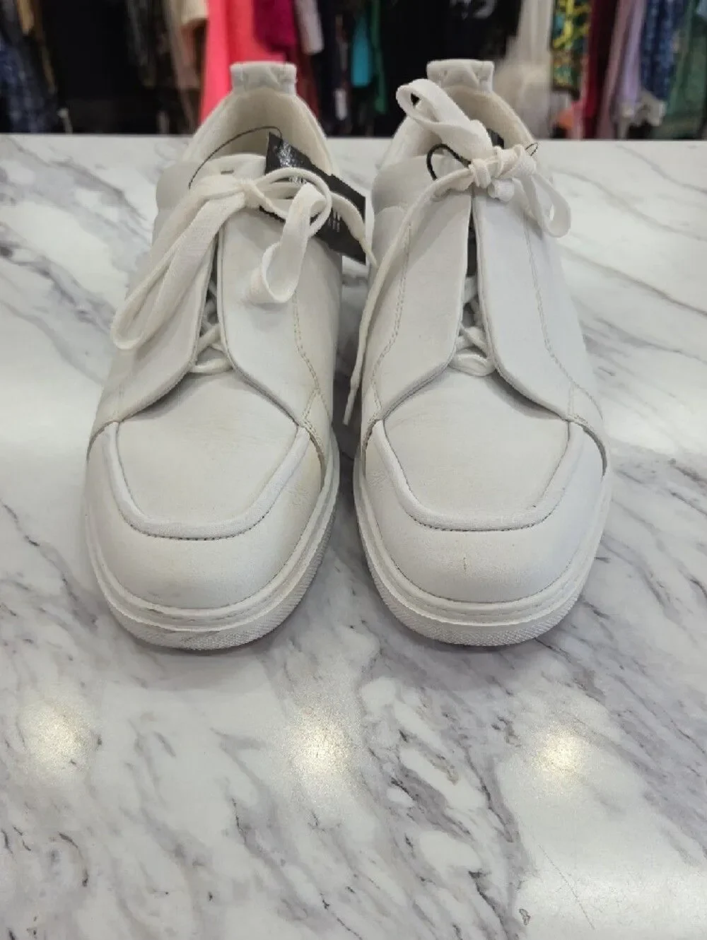 Christian Louboutin White Low-Top Leather Sneakers with Red Heel Accent